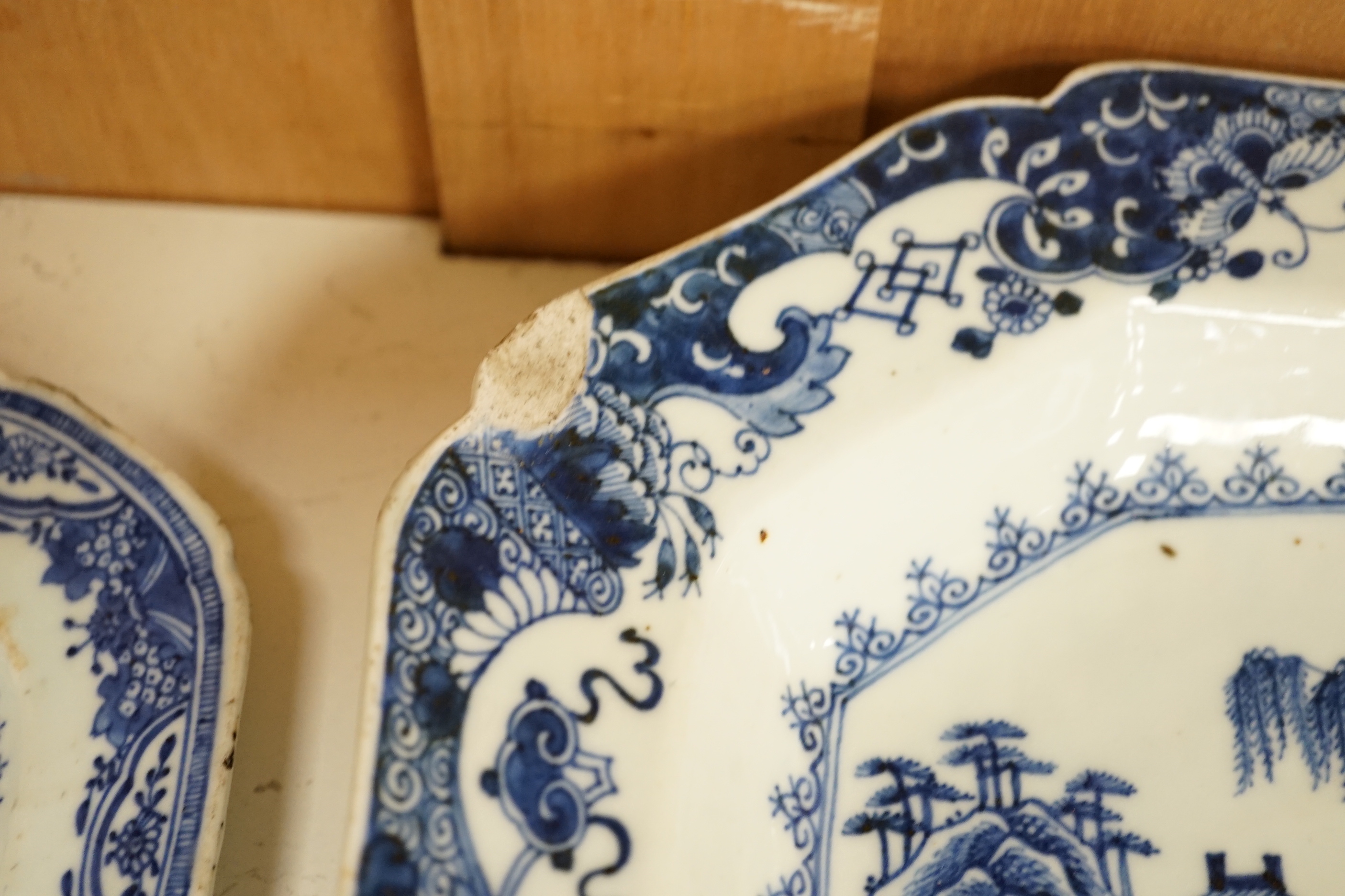 Three 18th century Chinese blue and white serving dishes and a similar plate, largest 38cm